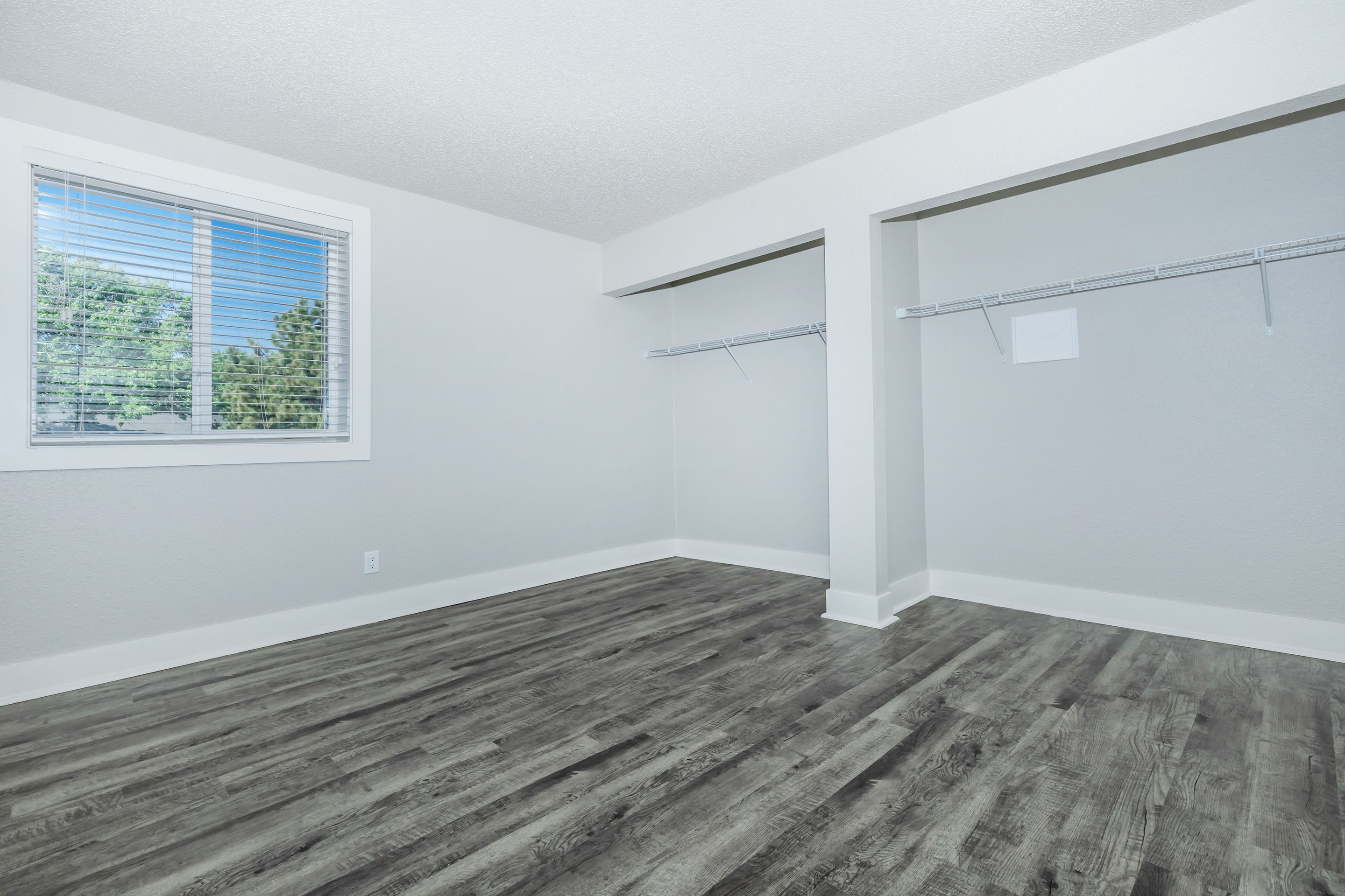 bedroom with large closet at Stone Canyon apartments in Colorado Springs